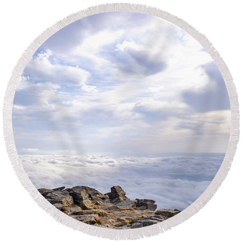Alpine Round Beach Towel featuring the photograph A day above the clouds at the top of the Pearala mountain in Madrid, a mountaineering and adventure excursion. #2 by Joaquin Corbalan