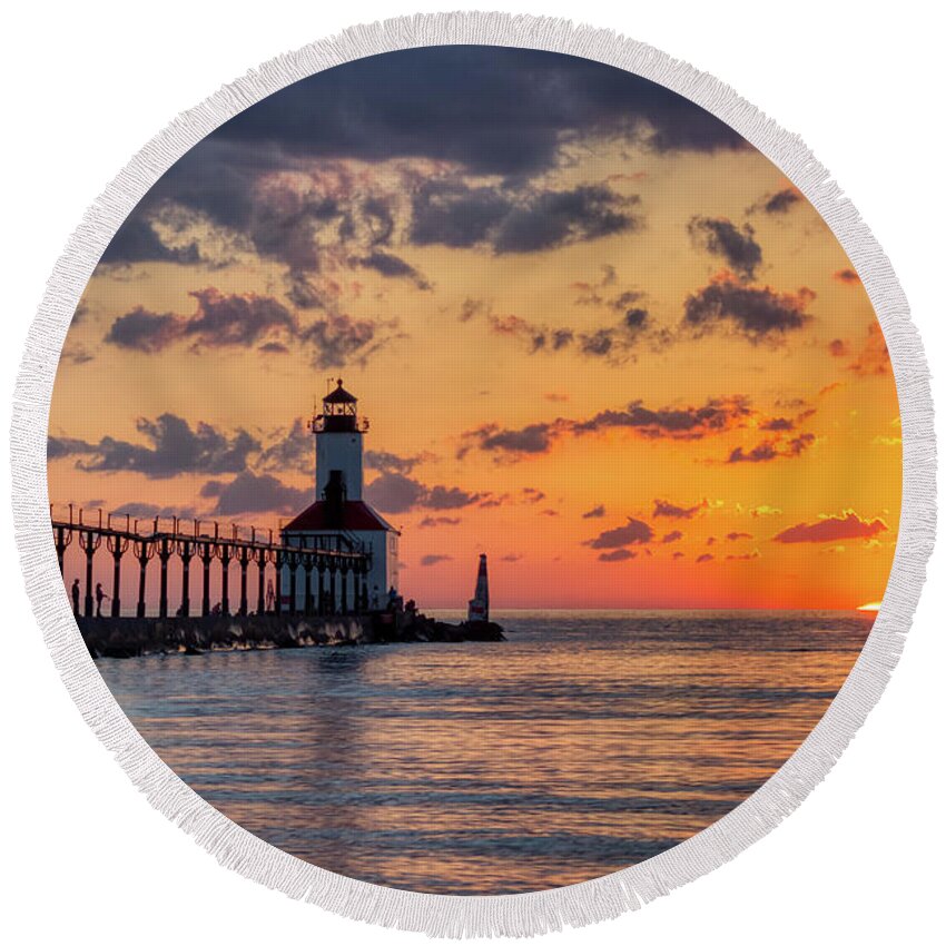 Architecture Round Beach Towel featuring the photograph Dramatic Sunset at Michigan City East Pierhead Lighthouse #1 by Andy Konieczny