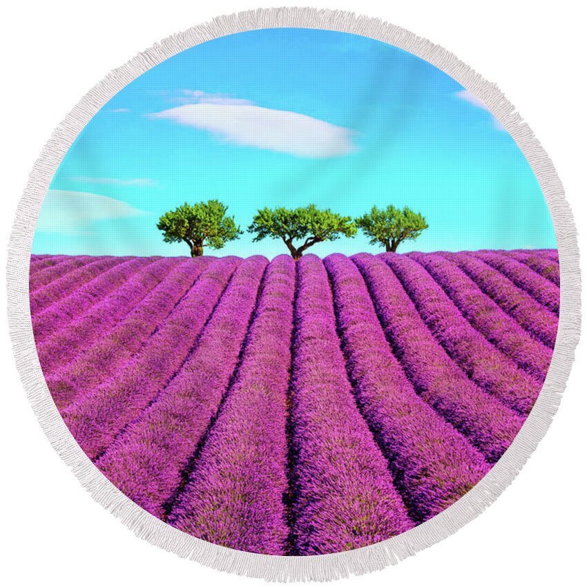 Lavender Round Beach Towel featuring the photograph Lavender and trees on the top of the hill. Provence, France by Stefano Orazzini