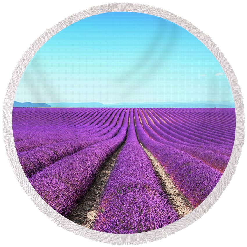 Aromatherapy Round Beach Towel featuring the photograph Endless rows of lavender, Provence by Stefano Orazzini