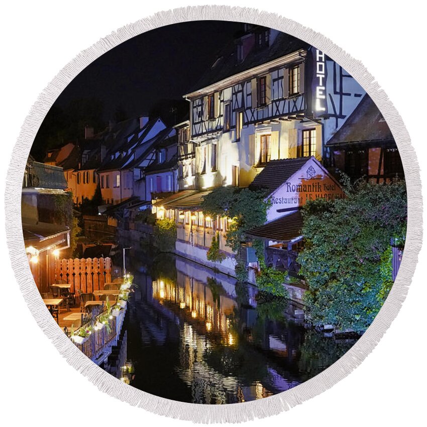 Colmar France Round Beach Towel featuring the photograph Reflections Off Of A Canal In The La Petite Venice Area Of Colmar France #1 by Rick Rosenshein