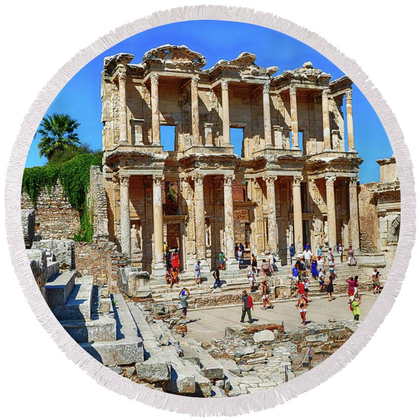 Ephesus Round Beach Towel featuring the photograph Tourists explore the Library of Celsus  #1 by Steve Estvanik