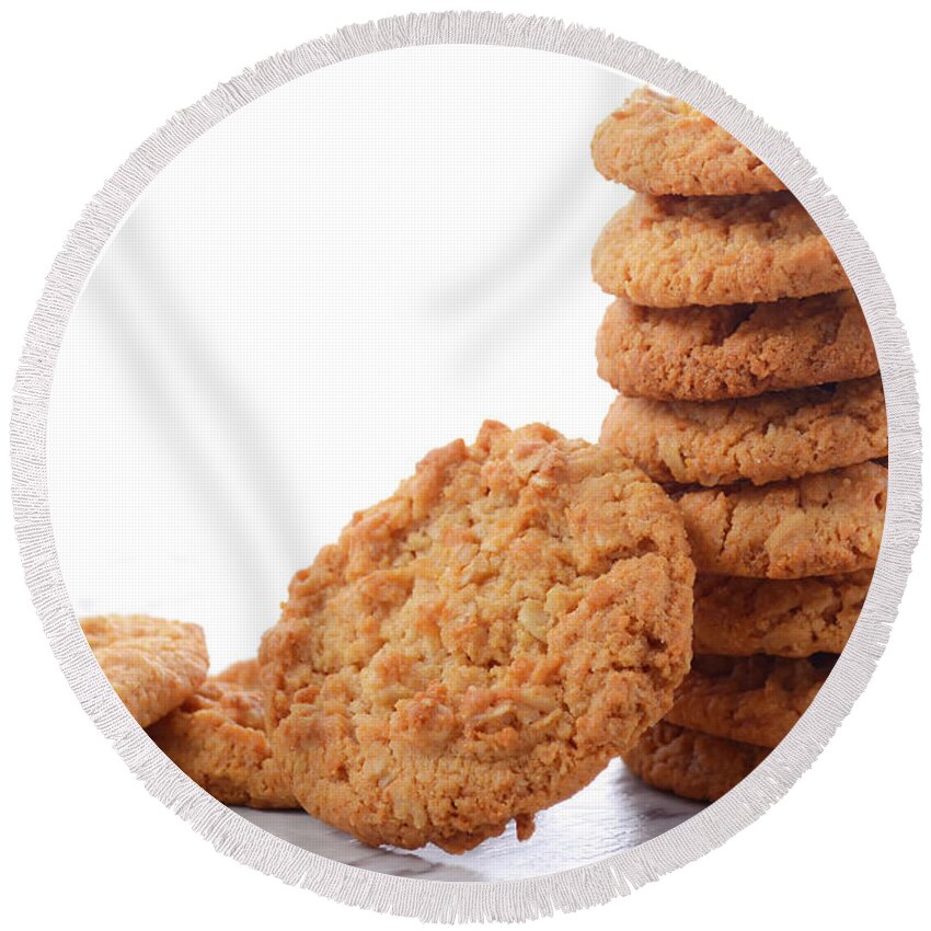 Anzac Biscuit Round Beach Towel featuring the photograph Traditional ANZAC Biscuits on White Background #1 by Milleflore Images