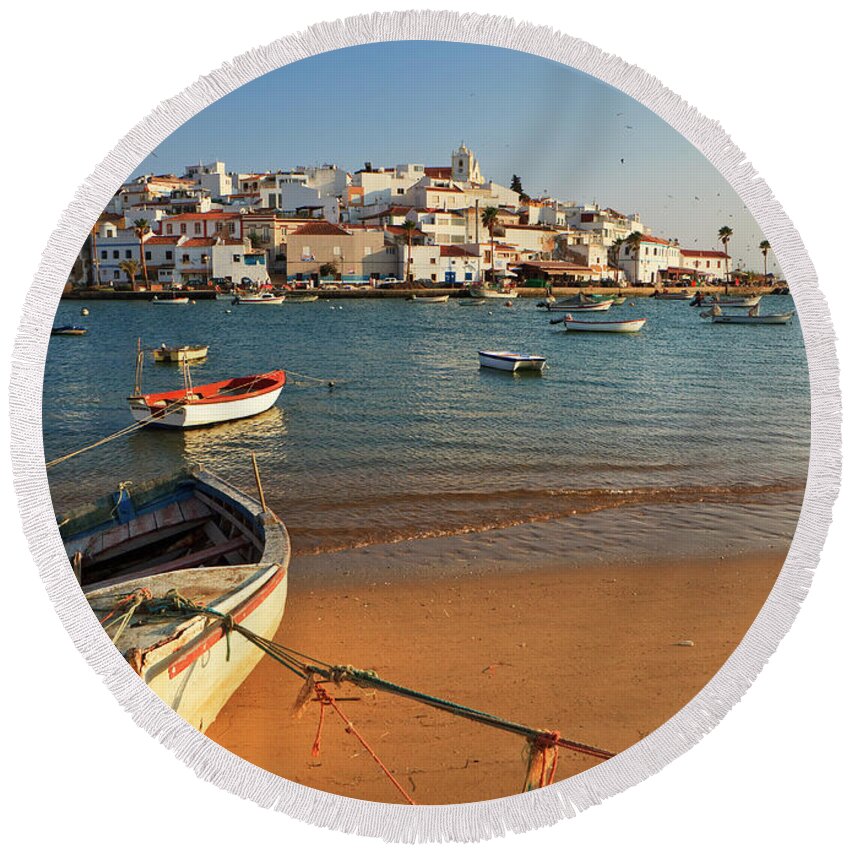 Estock Round Beach Towel featuring the digital art Portugal, Faro, Ferragudo, Atlantic Ocean, Algarve, The Fishing Village Of Ferragudo Near Portimao #2 by Luigi Vaccarella