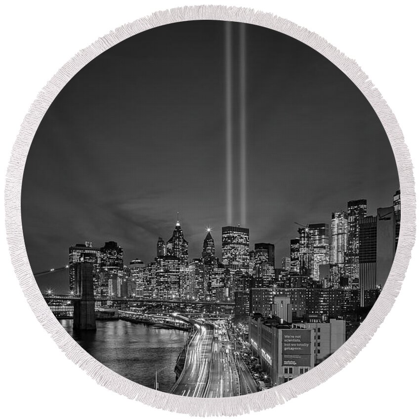911 Memorial Round Beach Towel featuring the photograph 911 Tribute In Light In NYC BW by Susan Candelario