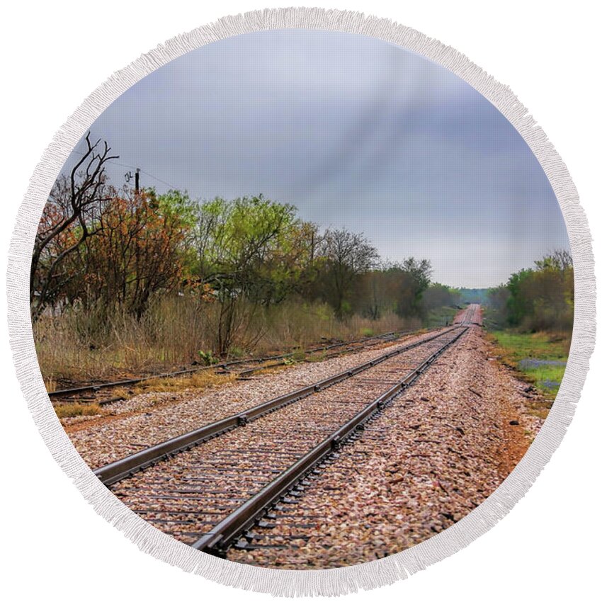Railroad Tracks Round Beach Towel featuring the photograph A Touch of Blue Along the Tracks by Joan Bertucci