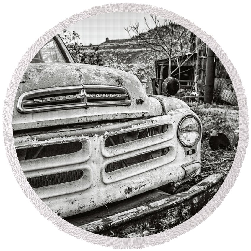 Pickup Round Beach Towel featuring the photograph Abandoned Ghost Town Studebaker Truck by Edward Fielding
