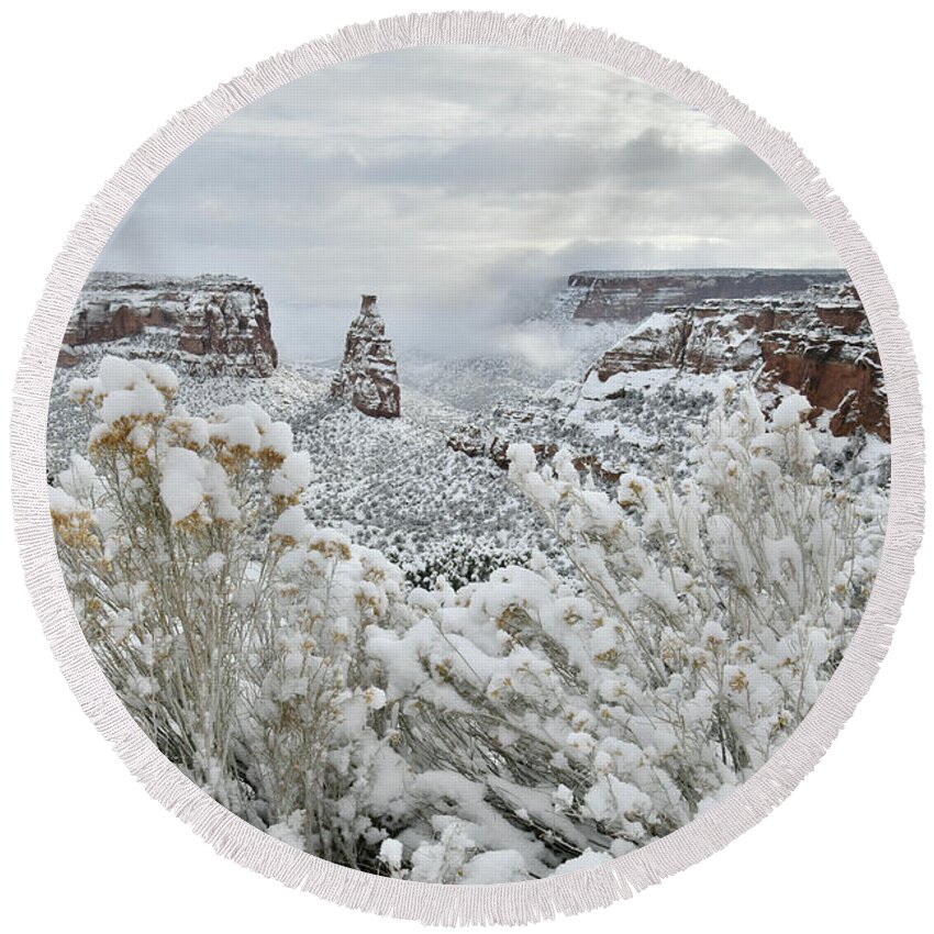 Colorado National Monument Round Beach Towel featuring the photograph Beautiful Snow Morning along Rim Rock Drive by Ray Mathis