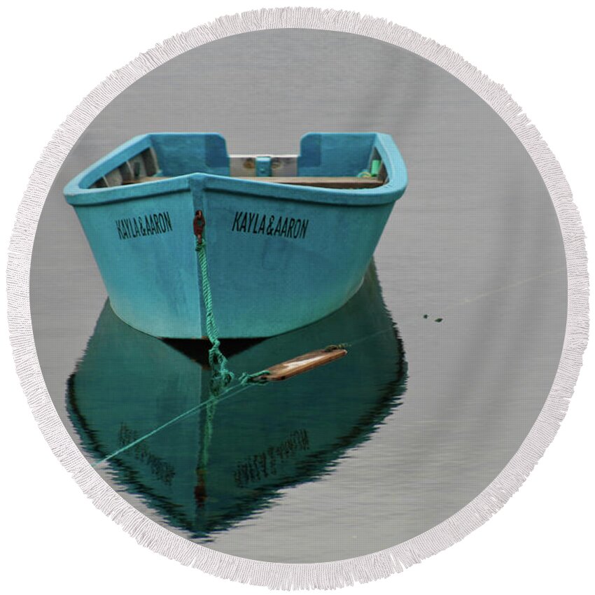 Solitude Round Beach Towel featuring the photograph Blue boat floating by Tatiana Travelways