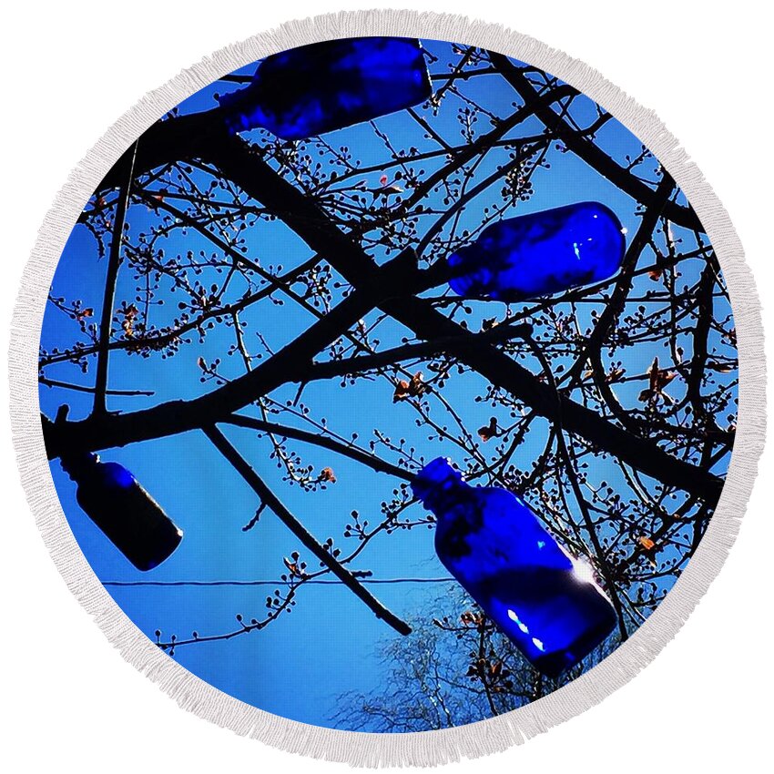 Blue Bottles Round Beach Towel featuring the photograph Blue Bottles in Tree by Suzanne Lorenz