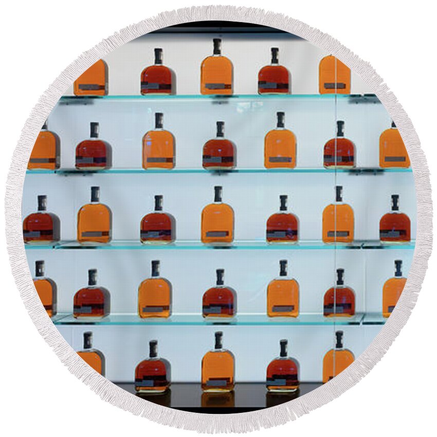 Woodford Reserve Round Beach Towel featuring the photograph Bourbon Bottles by Susan Rissi Tregoning
