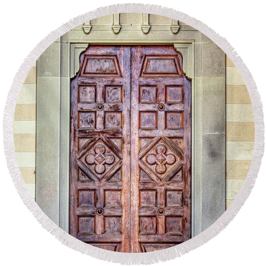 Medieval Round Beach Towel featuring the photograph Carved Door of Cortona by David Letts
