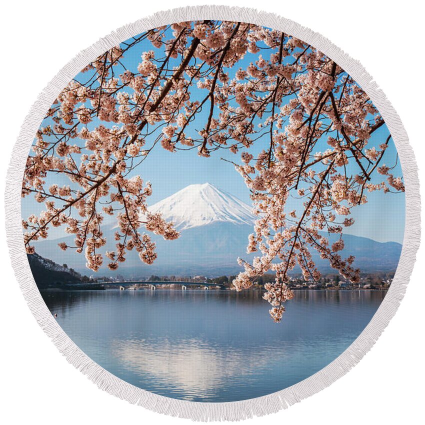 Japan Round Beach Towel featuring the photograph Cherry tree and Mt. Fuji reflected in lake, Japan by Matteo Colombo