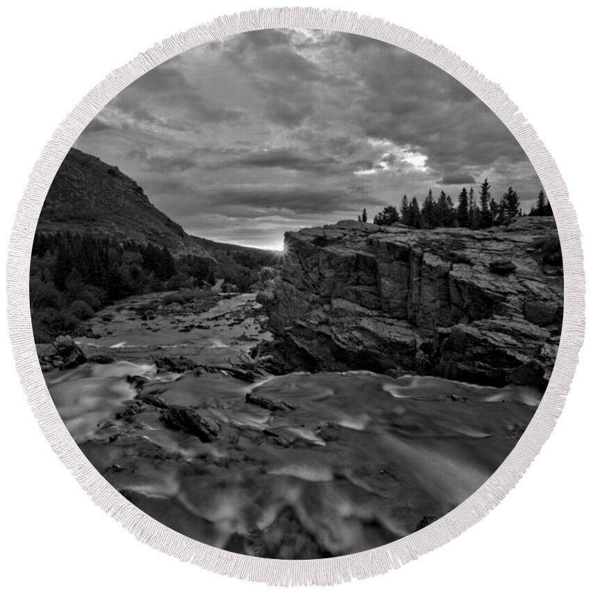 Swiftcurrent Falls Round Beach Towel featuring the photograph First Sunlight Over Swiftcurrent Falls Black And White by Adam Jewell