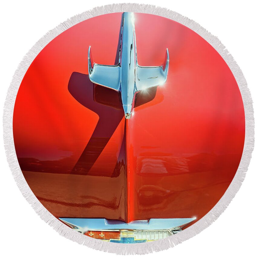Vehicle Round Beach Towel featuring the photograph Hood Ornament on a Red 55 Chevy by Scott Norris