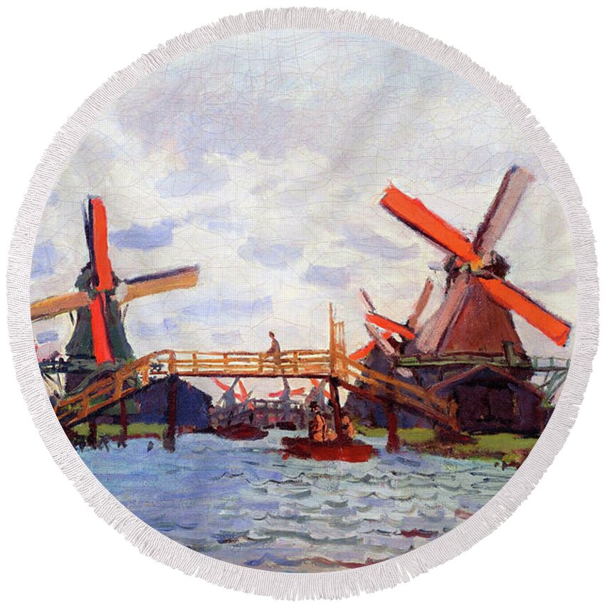 Claude Monet Round Beach Towel featuring the painting Mills at Westzijderveld near Zaandam - Digital Remastered Edition by Claude Monet