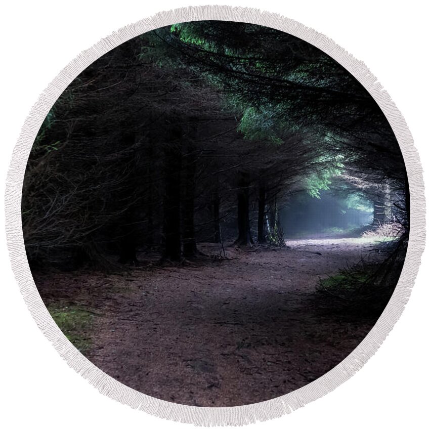 Wood Round Beach Towel featuring the photograph Narrow Path Through Foggy Mysterious Forest by Andreas Berthold