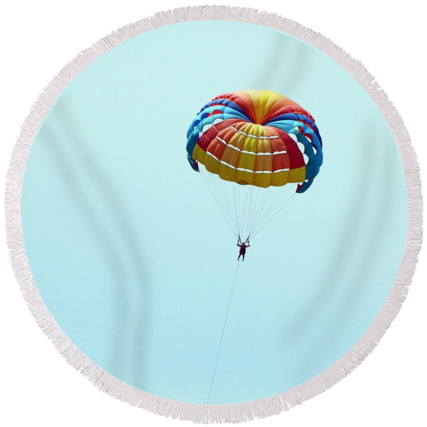 Sea Round Beach Towel featuring the photograph Parachuting over the sea, parasailing by Oleg Prokopenko