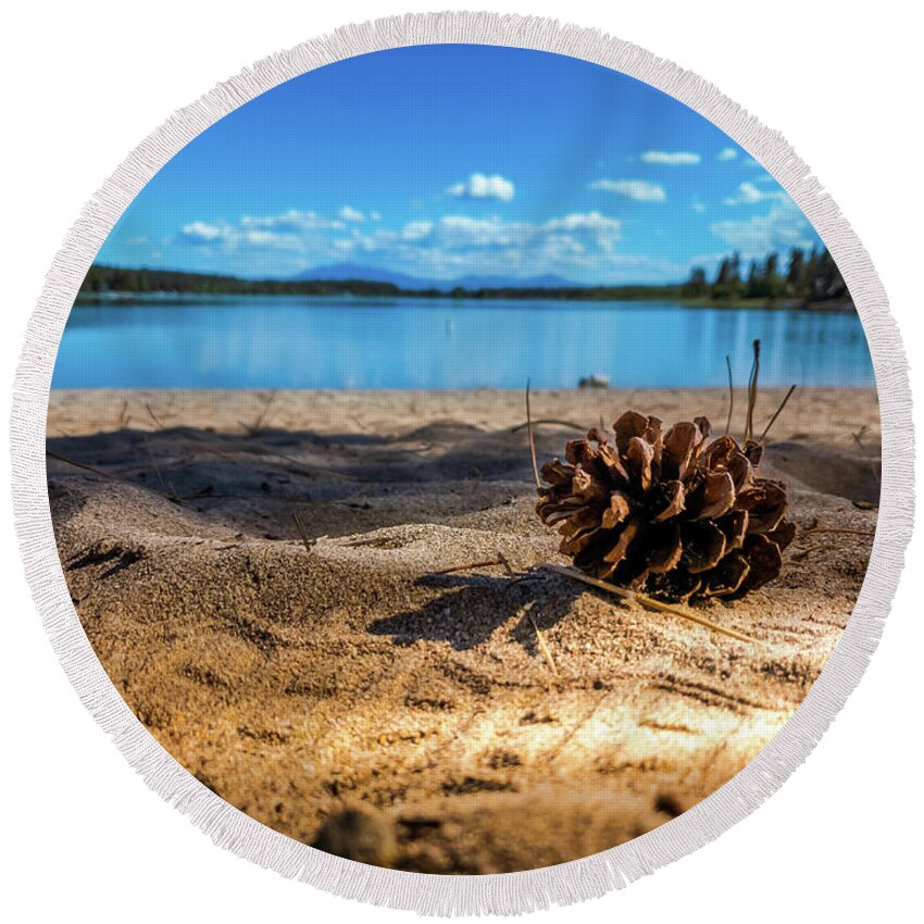 Pine Cone Round Beach Towel featuring the photograph Pine cone on the beach by Thomas Nay