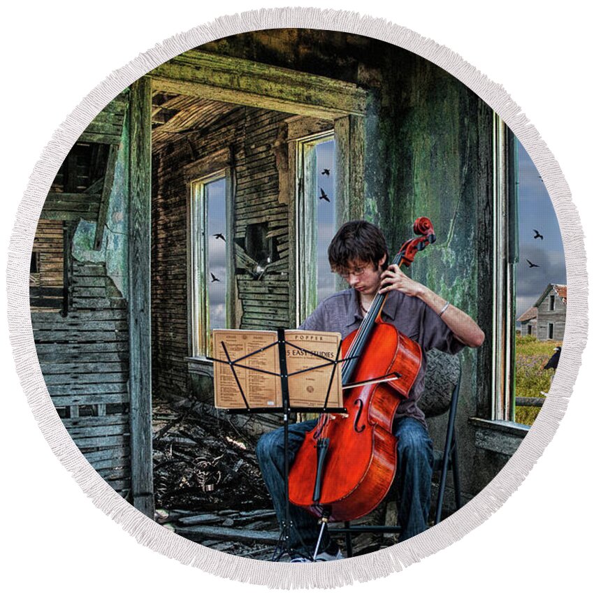 Cello Round Beach Towel featuring the photograph Practicing among the Ruins. A Cello Player playing Music by Randall Nyhof
