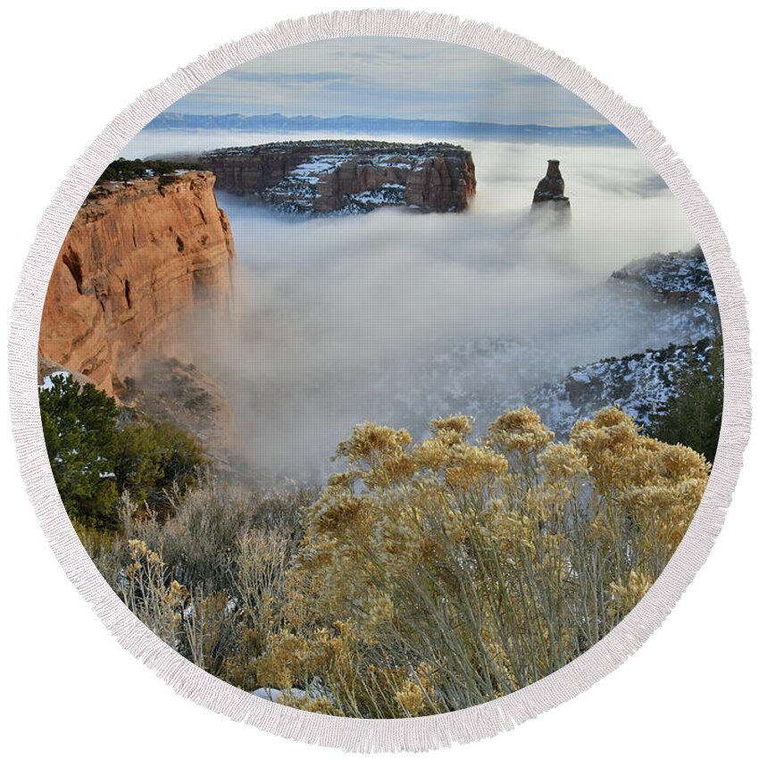 Colorado National Monument Round Beach Towel featuring the photograph Rim Rock Drive View of Fogged Independence Canyon by Ray Mathis