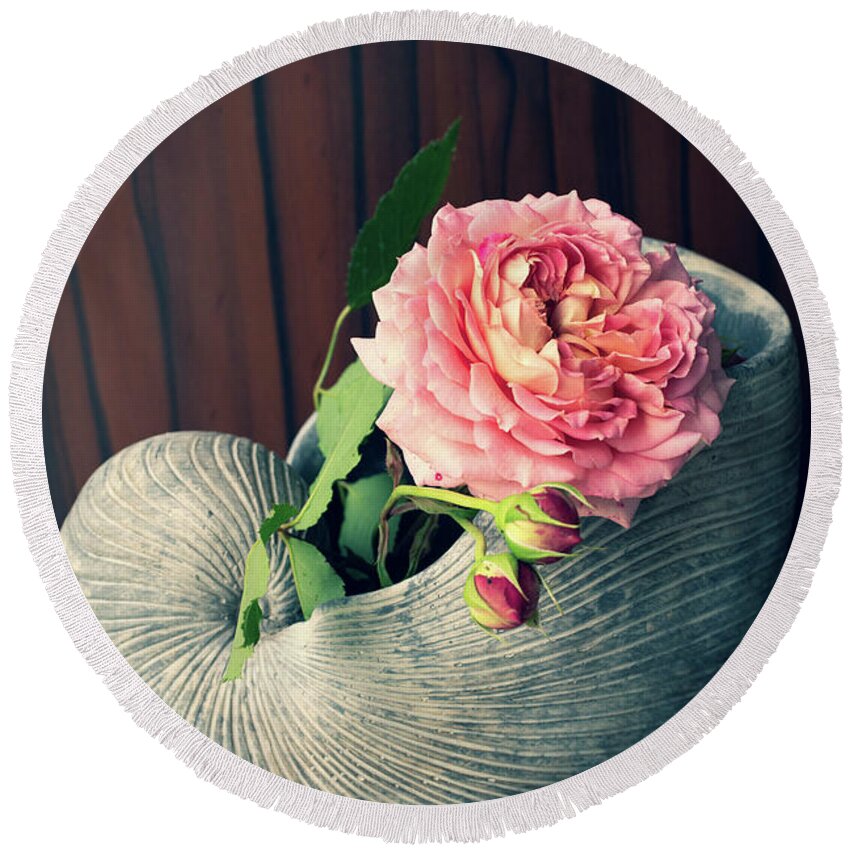Ip_13229678 Round Beach Towel featuring the photograph Rose In Ceramic Nautilus Shell by Eising Studio