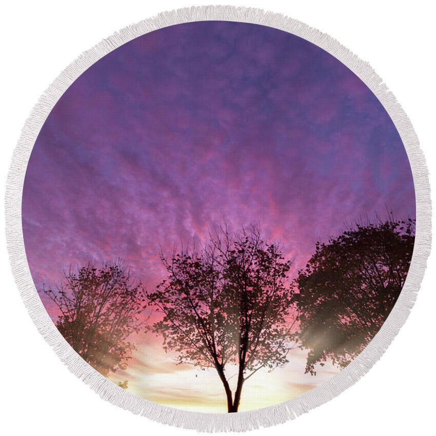 Alone Round Beach Towel featuring the photograph Rural purple sunset over winter trees by Simon Bratt
