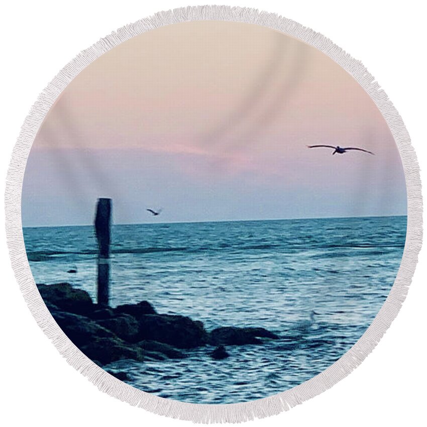 Birds Round Beach Towel featuring the photograph Seabirds Feeding at Sunset in Captiva Island Florida off the Jetty by Shelly Tschupp