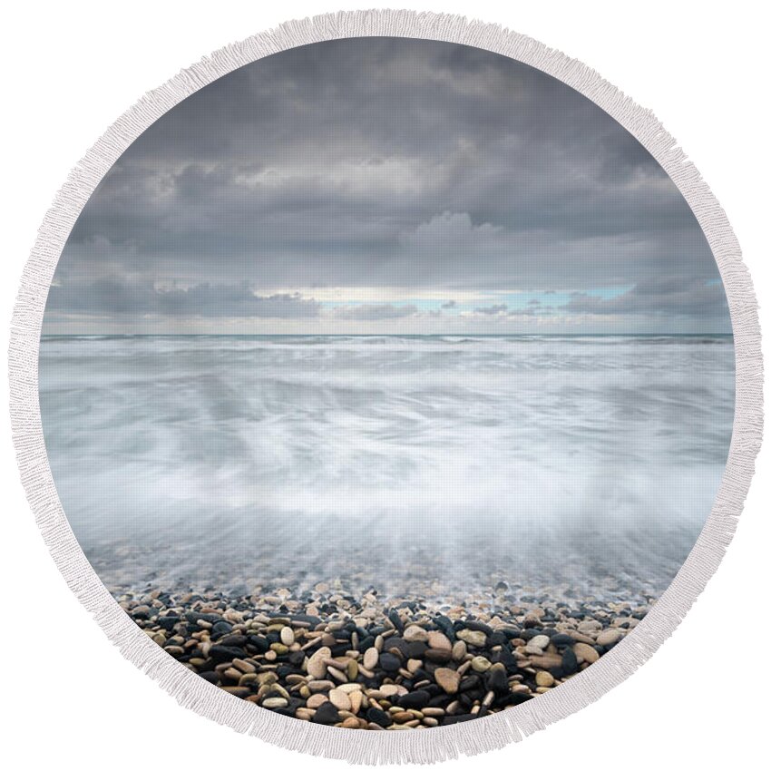 Coast Round Beach Towel featuring the photograph Stormy Sky and Wavy ocean by Michalakis Ppalis