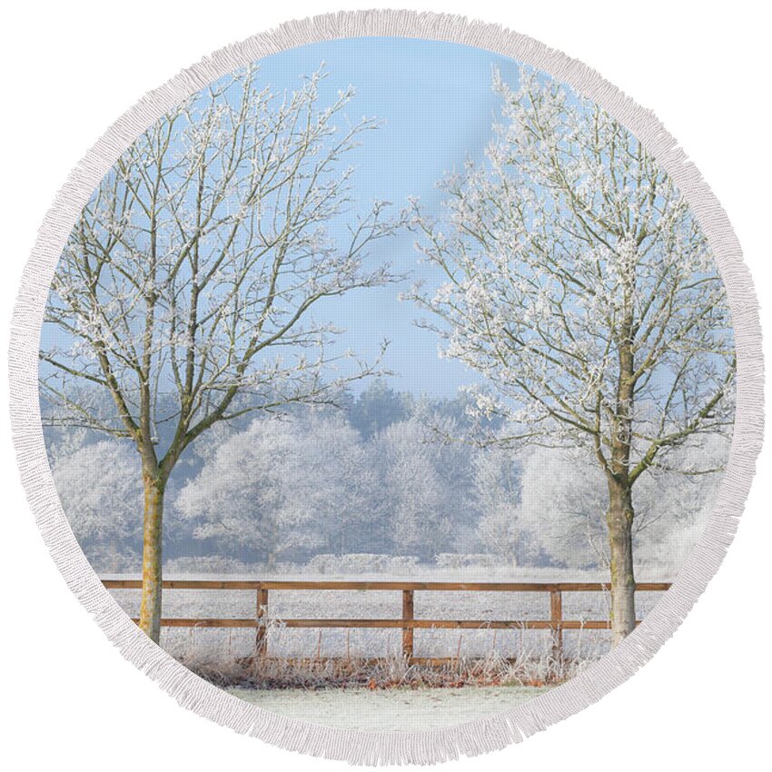 Landscape Round Beach Towel featuring the photograph Two trees in a deep frozen winter by Simon Bratt