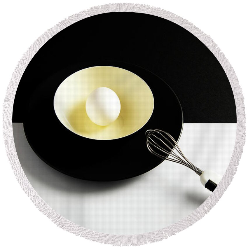 Egg Round Beach Towel featuring the photograph White egg on a yellow bowl. by Michalakis Ppalis