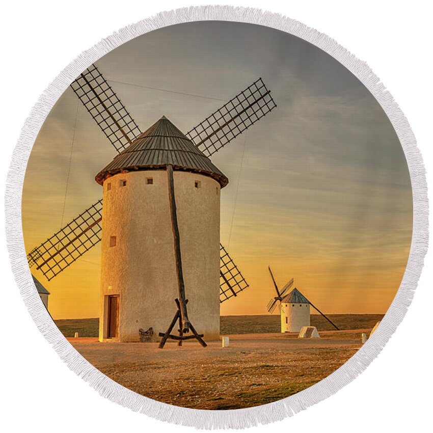 Spain Round Beach Towel featuring the photograph Windmills at Campo de Criptana La Mancha Spain_GRK2370_02062019 by Greg Kluempers