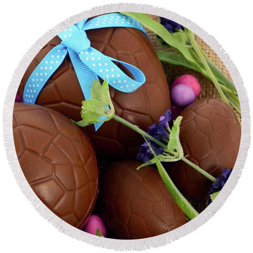 Blue Round Beach Towel featuring the photograph Happy Easter chocolate eggs #1 by Milleflore Images
