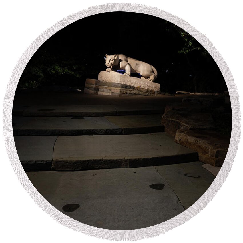 State College Pennsylvania Round Beach Towel featuring the photograph Nittany Lion Shrine at night at Penn State University #1 by Eldon McGraw