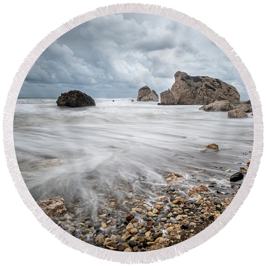Sea Waves Round Beach Towel featuring the photograph Seascape with windy waves during stormy weather on a rocky coast by Michalakis Ppalis