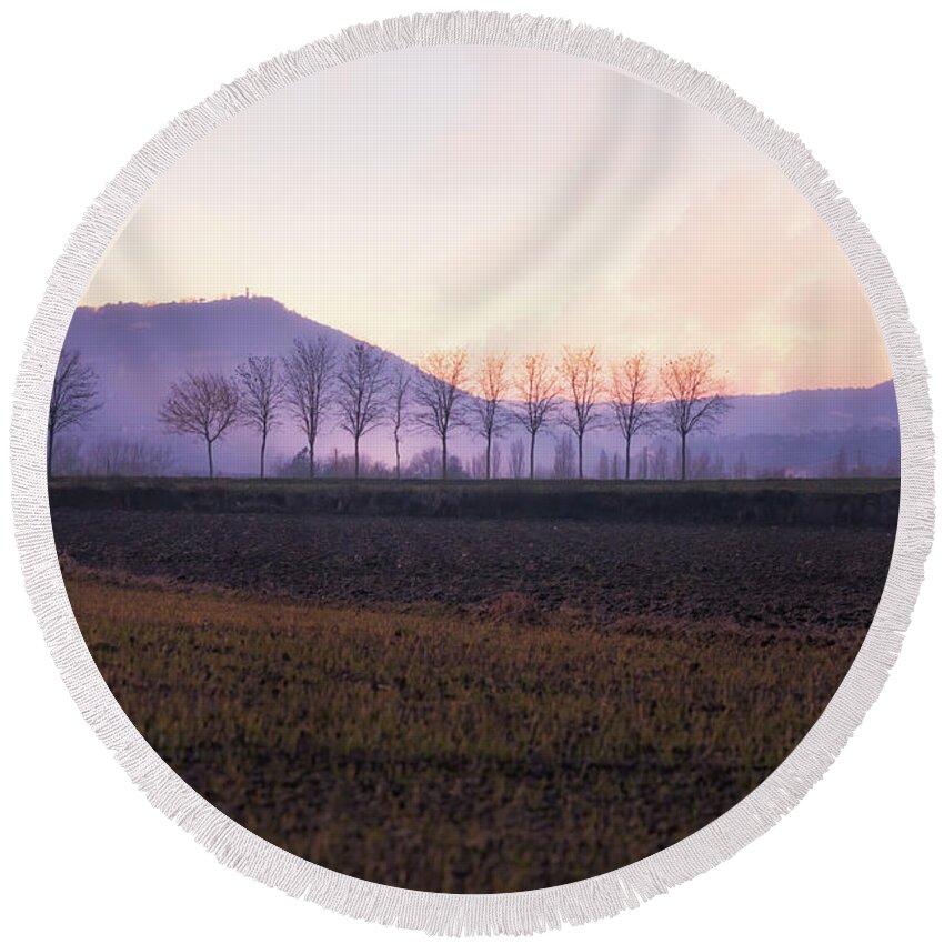 Agriculture Round Beach Towel featuring the photograph The mist settles in the valley after sunset by Jordi Carrio Jamila