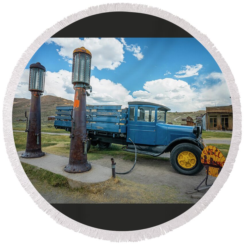 Bodie Round Beach Towel featuring the photograph 1930s Ford Model AA Bodie Gas Station by Ron Long Ltd Photography