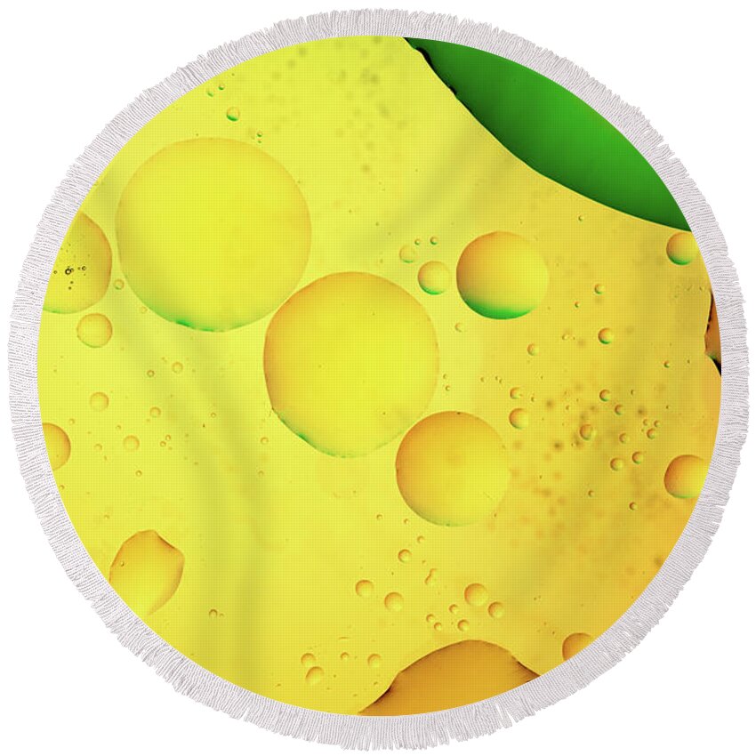 Fluid Round Beach Towel featuring the photograph Abstract, image of oil, water and soap with colourful background by Michalakis Ppalis