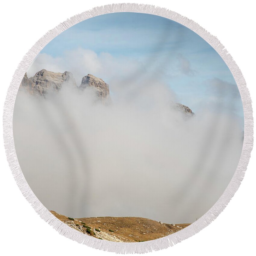 Tre Cime Round Beach Towel featuring the photograph Mountain landscape with fog in autumn. Tre Cime dolomiti Italy. by Michalakis Ppalis