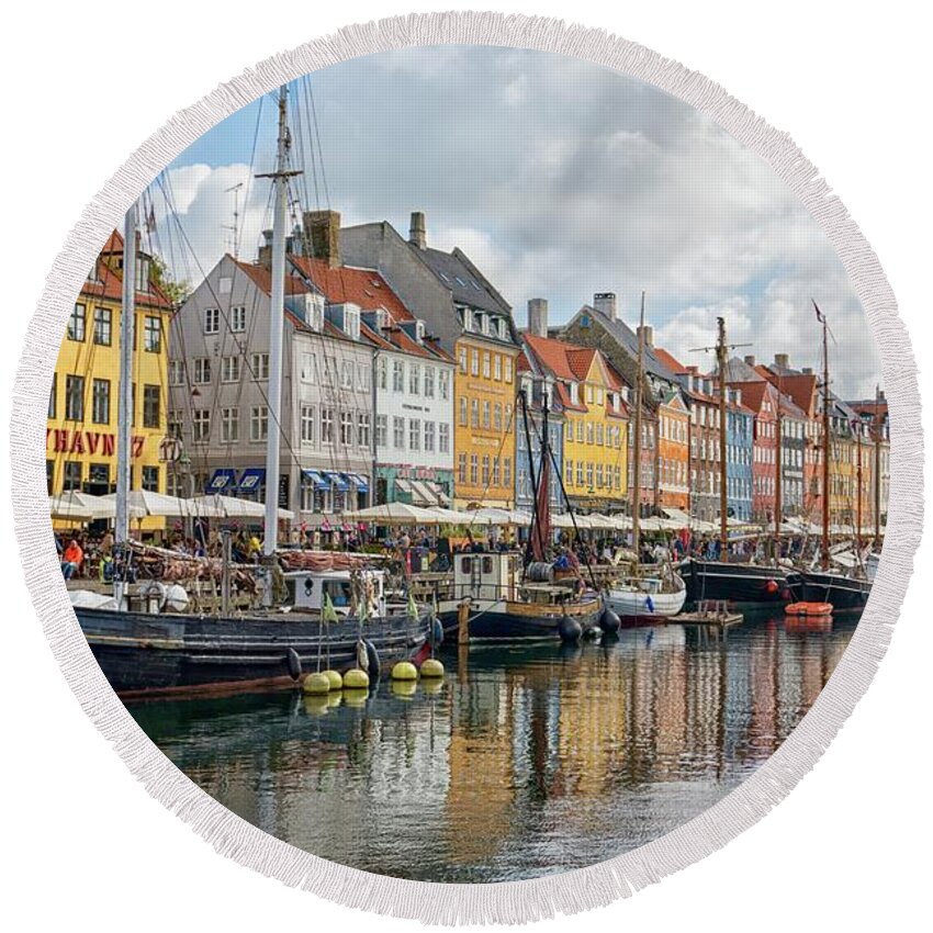 Architecture Round Beach Towel featuring the photograph Beautiful Nyhavn Canal in Copenhagen by Patricia Hofmeester