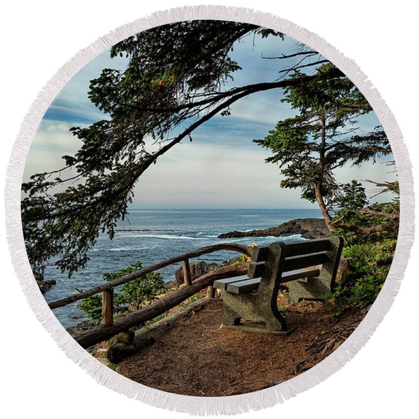 Alex Lyubar Round Beach Towel featuring the photograph A bench on the cliff over the seashore by Alex Lyubar