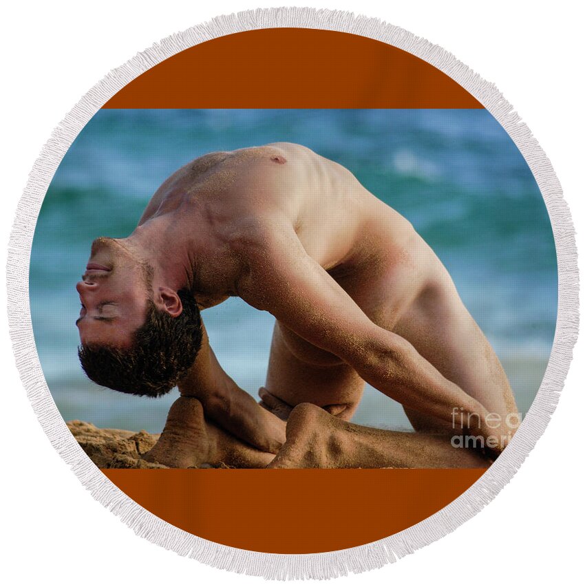 Nude Round Beach Towel featuring the photograph A handsome flexible male surfer in a difficult yoga pose. by Gunther Allen