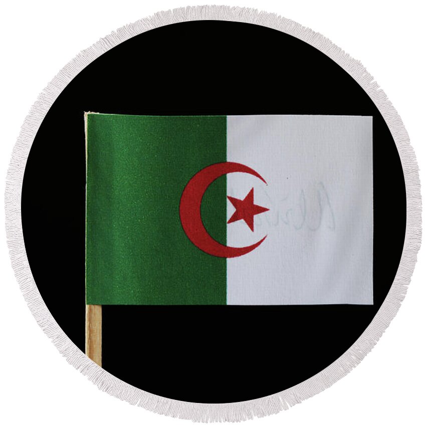 Algeria Round Beach Towel featuring the photograph A original and official flag of Algeria on toothpick on black background. Consists of two equal vertical bars, green and white with a red star and crescent by Vaclav Sonnek