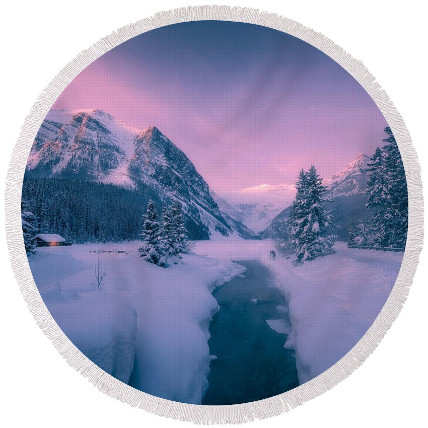 Winter Round Beach Towel featuring the photograph A winter sunrise at Lake Louise by Henry w Liu