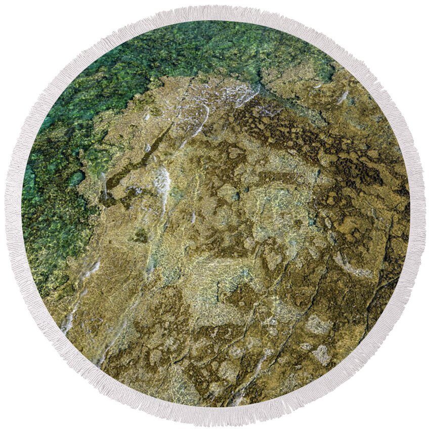 Seascape Round Beach Towel featuring the photograph Aerial drone view of sea transparent water with rocks on the bottom. Ocean background by Michalakis Ppalis