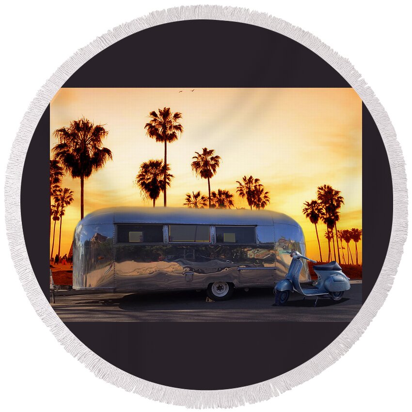 Sunset Round Beach Towel featuring the photograph Airstream trailer and Vespa Scooter at Sunset by Larry Butterworth