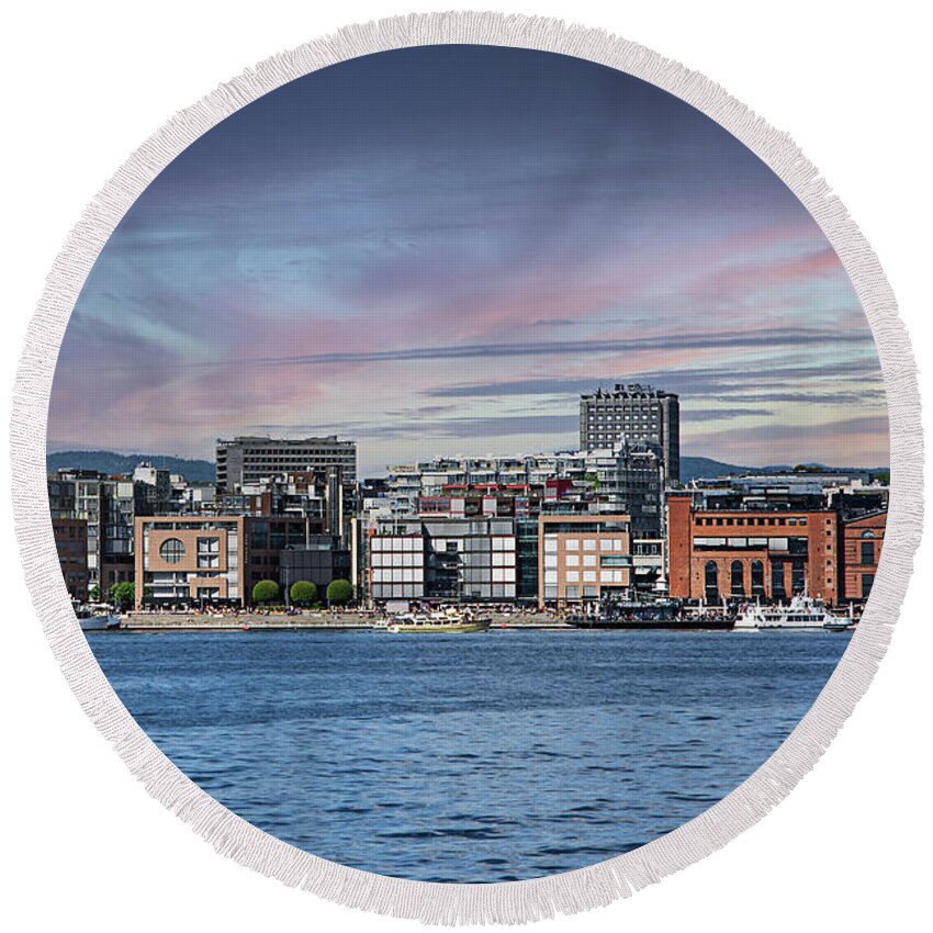 Oslo Round Beach Towel featuring the photograph Akerbrygge district of Oslo. by Bernhard Schaffer