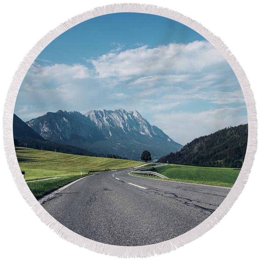 Overcast Round Beach Towel featuring the photograph Asphalt road in Schladming by Vaclav Sonnek