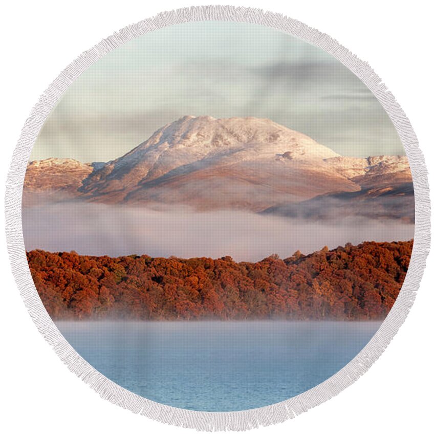Ben Lomond Round Beach Towel featuring the photograph Autumn mist shrouded between Mountain and Loch by Maria Gaellman