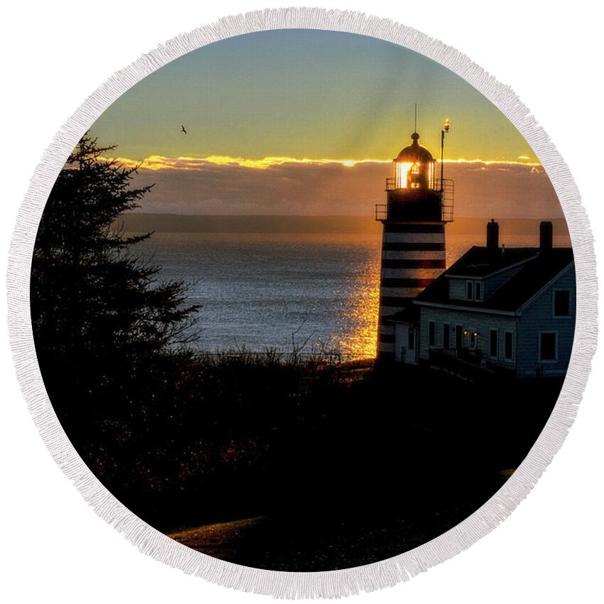 Backlit Sunrise At West Quoddy Head Lighthouse Lubec Round Beach Towel featuring the photograph Backlit Sunrise at West Quoddy Head Lighthouse Lubec Maine by Marty Saccone
